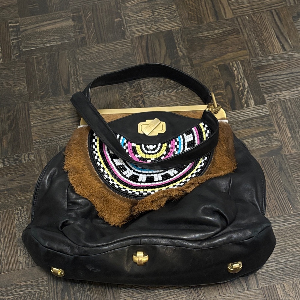 Unique NAVYBOOT Leather Bag with Beaded Design